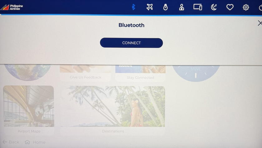 Seatback entertainment screen showing the Bluetooth audio pairing option on a Philippine Airlines A350