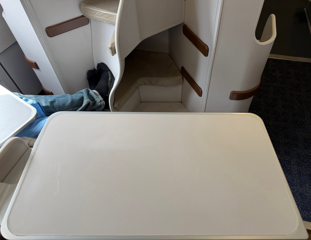 Side-mounted tray table folded out at a Philippine Airlines A330 business class seat
