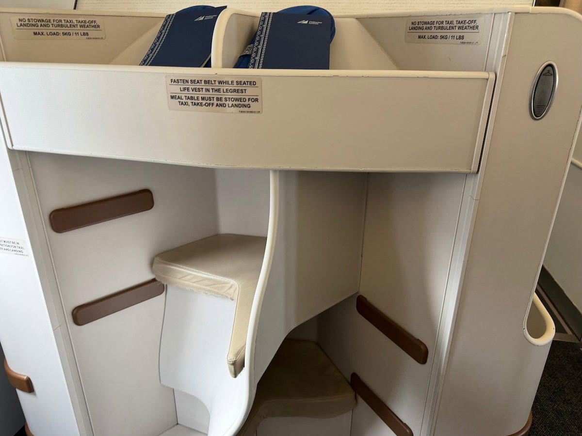 Footwell of a Philippine Airlines A330 business class seat in the top/bottom layout