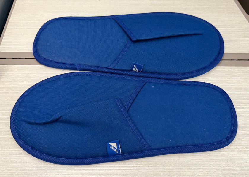 Pair of thin slippers provided in Philippine Airlines business class