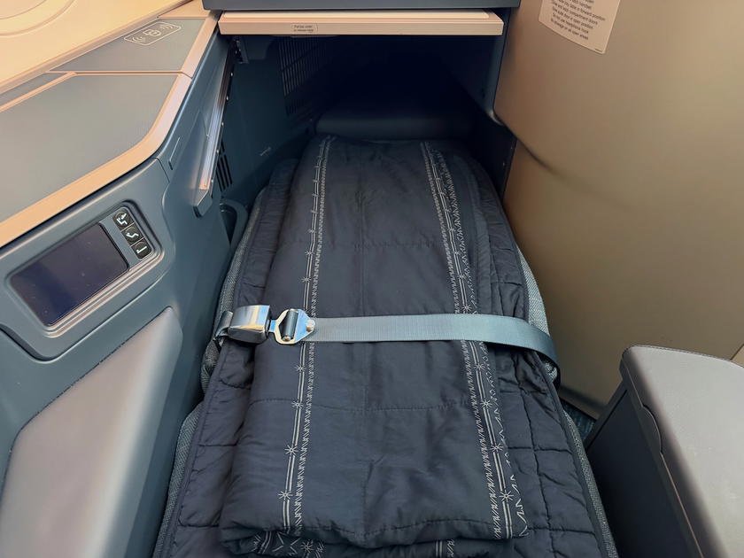Made-up lie-flat bed in Philippine Airlines business class on the A350