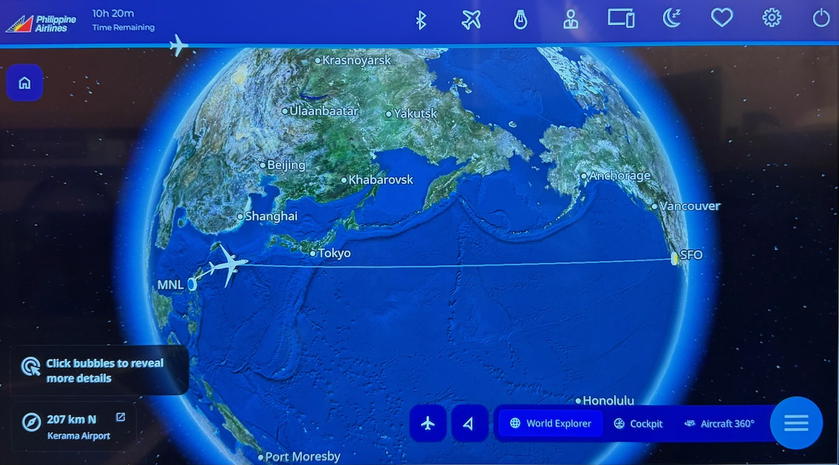 Flight map on the seat screen showing the plane near the southern islands of Japan