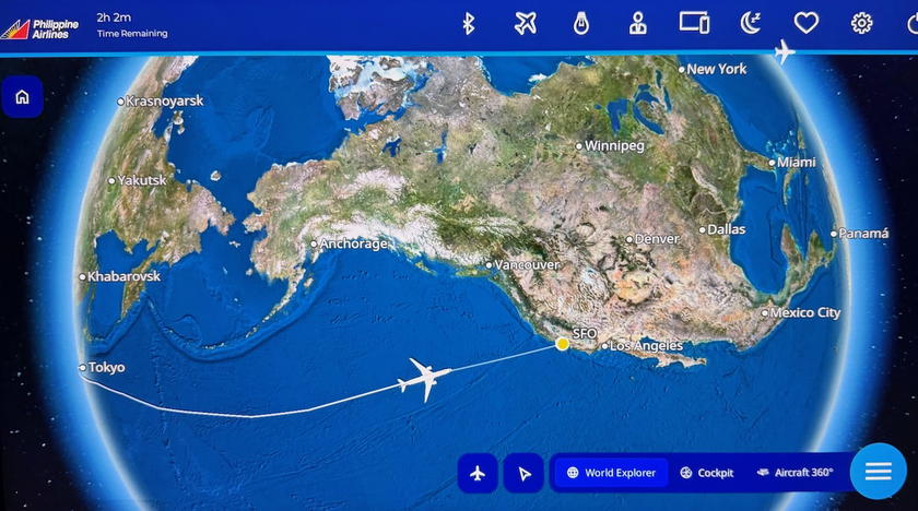 Seat screen flight map showing about two hours remaining to San Francisco