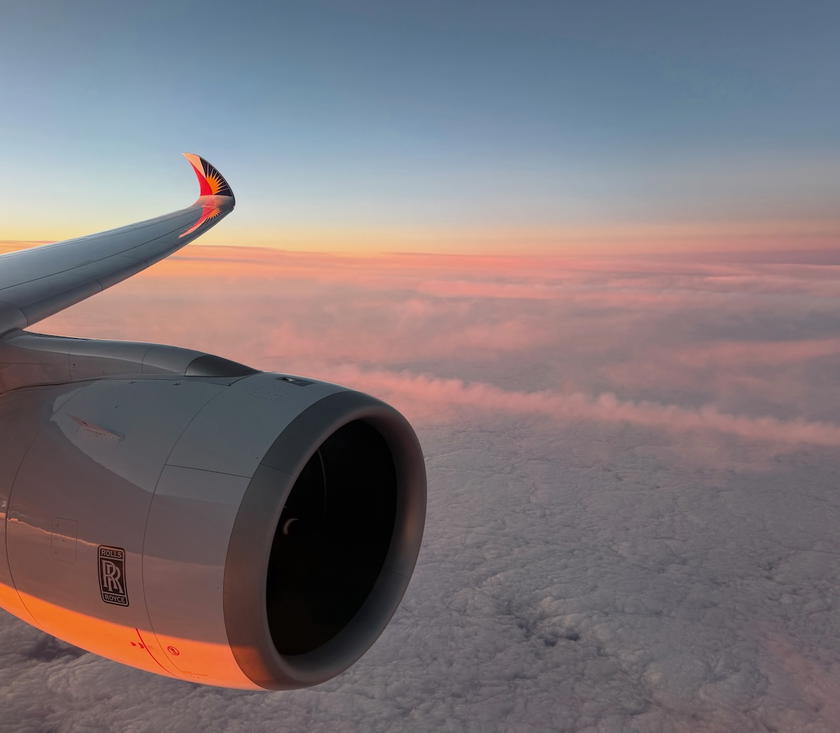 View of the Airbus A350 wing from a cabin window during the approach to San Francisco