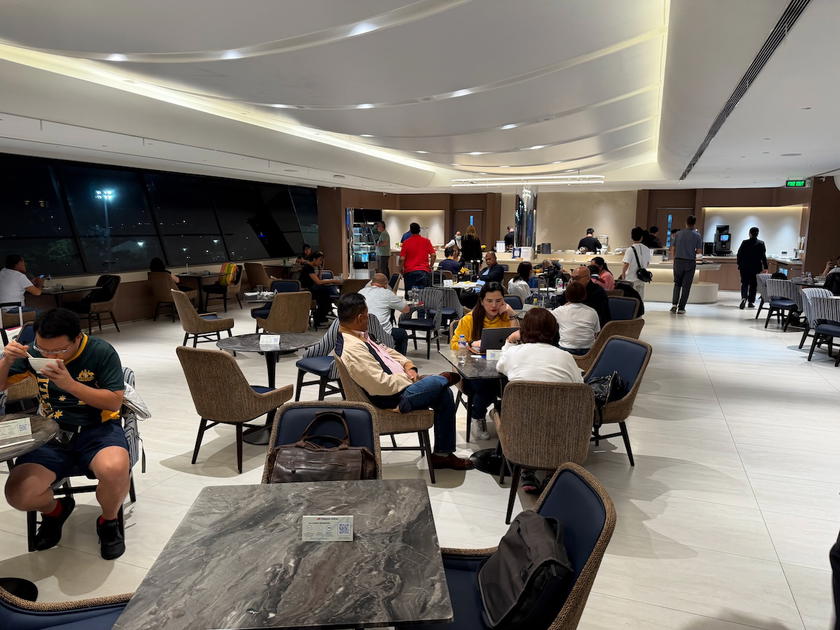 Seating area in the Philippine Airlines Mabuhay Lounge with chairs and low tables