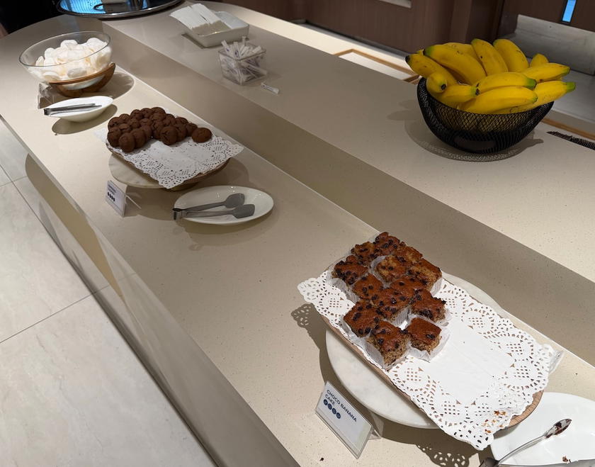 Self-serve food stations at the Mabuhay Lounge in Manila