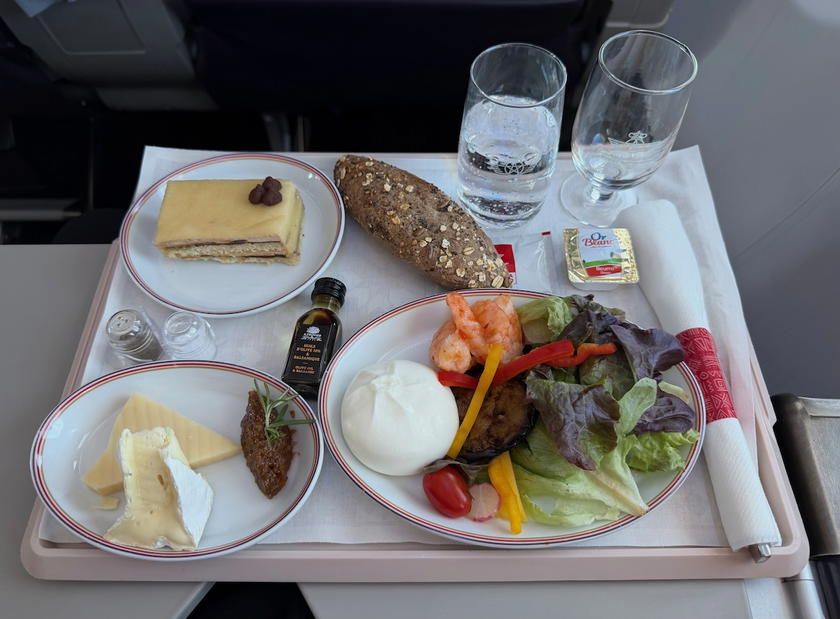 Royal Air Maroc business class snack tray with burrata, prawns, vegetables, cheese, and dessert