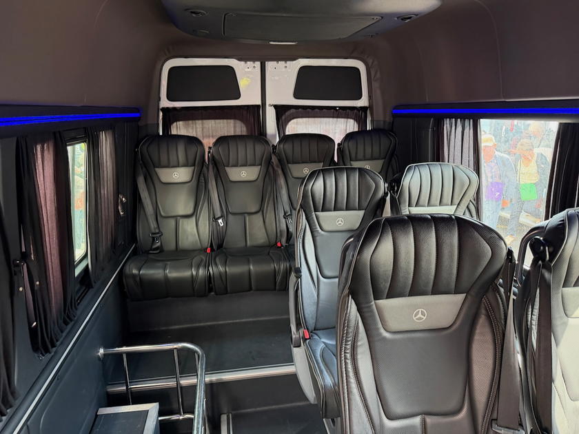 Dedicated business class bus used for Royal Air Maroc passengers at a remote airport stand