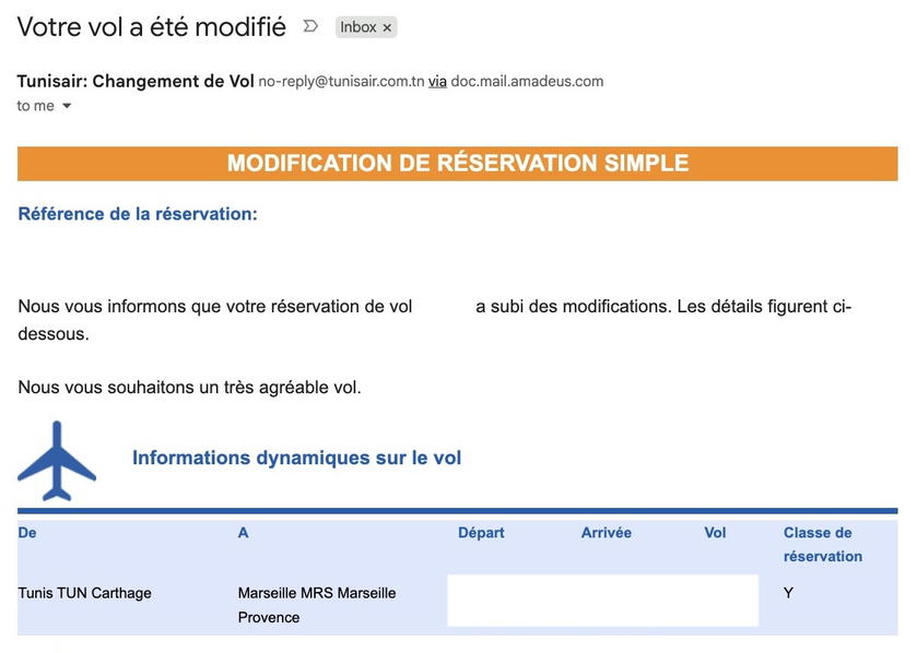 Tunisair email notification informing a passenger that their flight reservation has changed to economy class