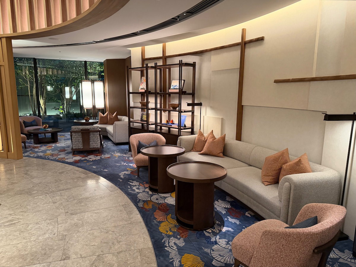 Lounge seating beside the reception area at the Waldorf Astoria Osaka