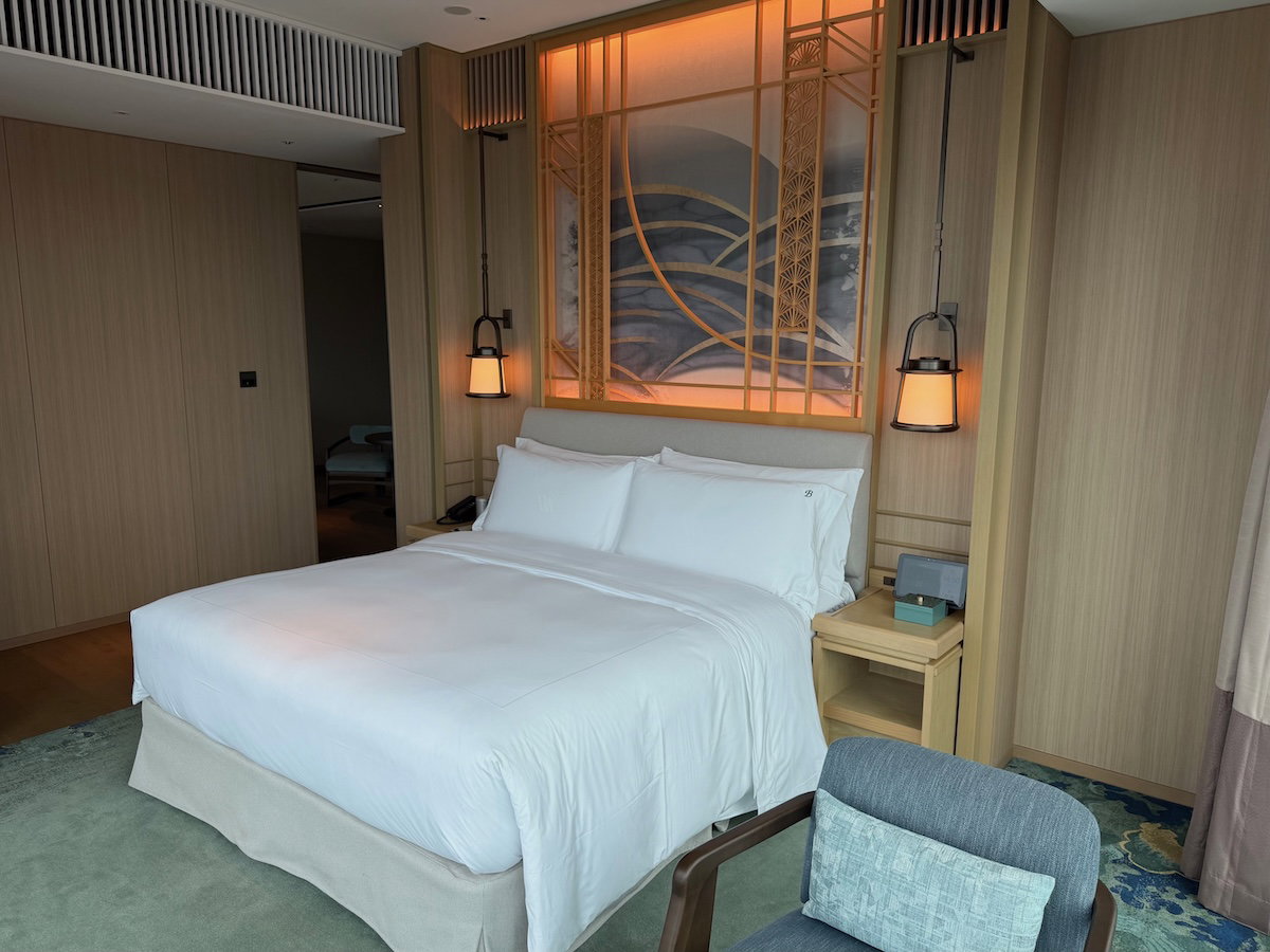 Suite bedroom with bed and furnishings at the Waldorf Astoria Osaka
