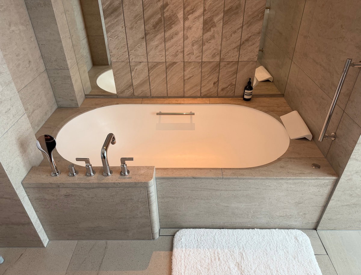 Soaking bathtub in the Waldorf Astoria Osaka suite bathroom