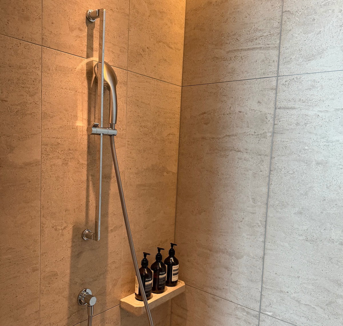 Walk-in shower in the Waldorf Astoria Osaka suite bathroom