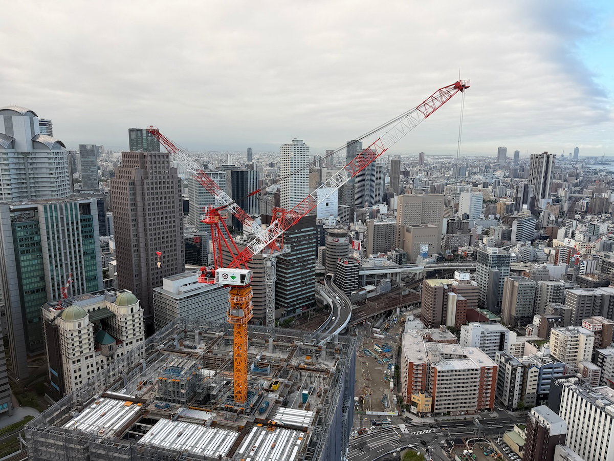 Suite window view toward a high rise under construction next to the Waldorf Astoria Osaka
