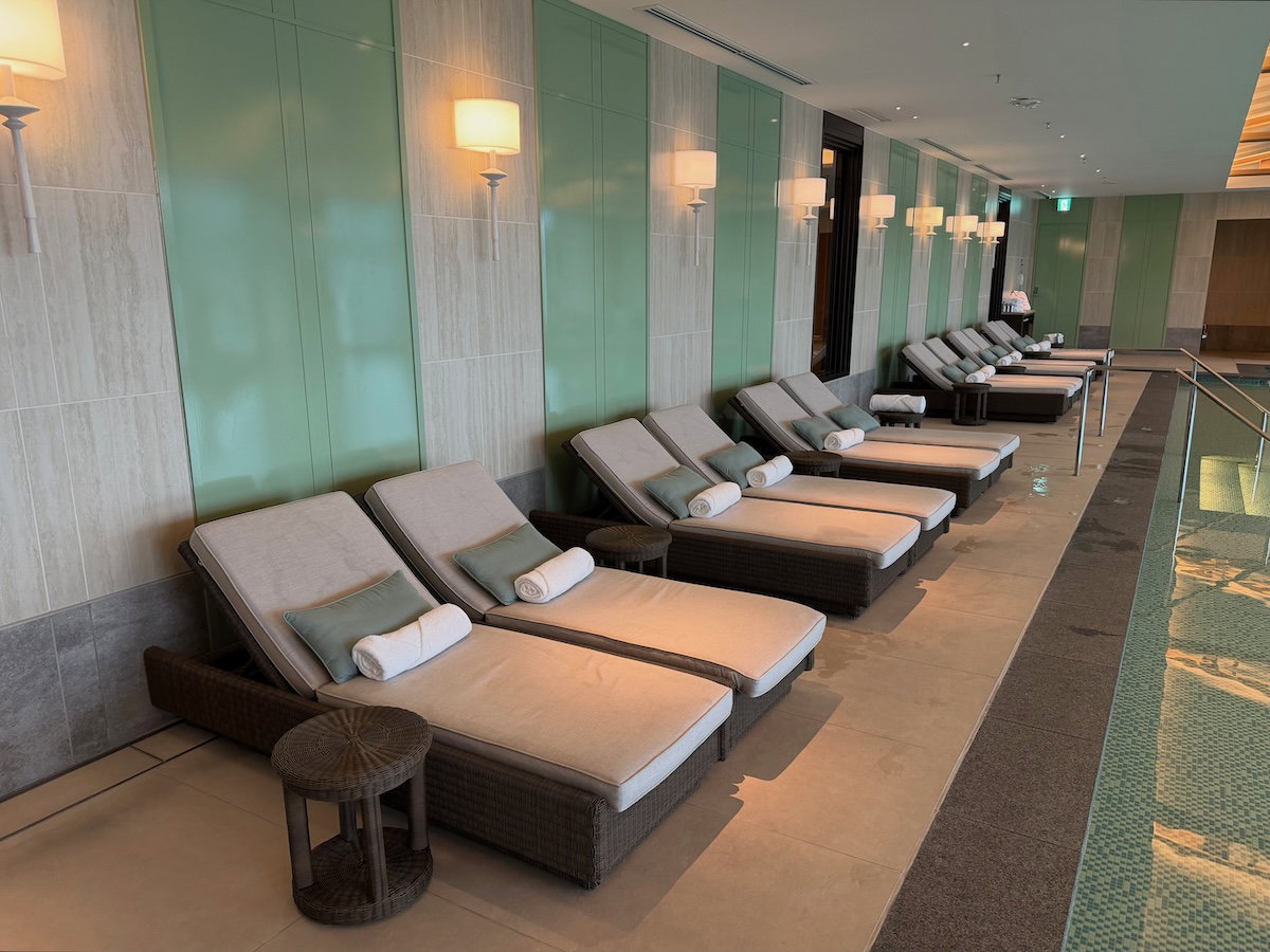 Lounge seating beside the Waldorf Astoria Osaka pool