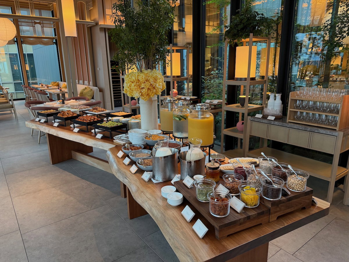 Pastries, cereal and juice on the breakfast buffet in the main dining area of Jolie Brasserie