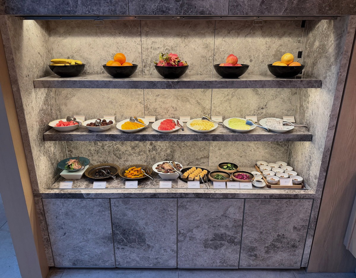 Hot breakfast items such as sausage and hash browns on the Jolie Brasserie buffet